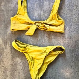 Cheeky bikini, excellent condition. Both marked as a large, fit like a medium.